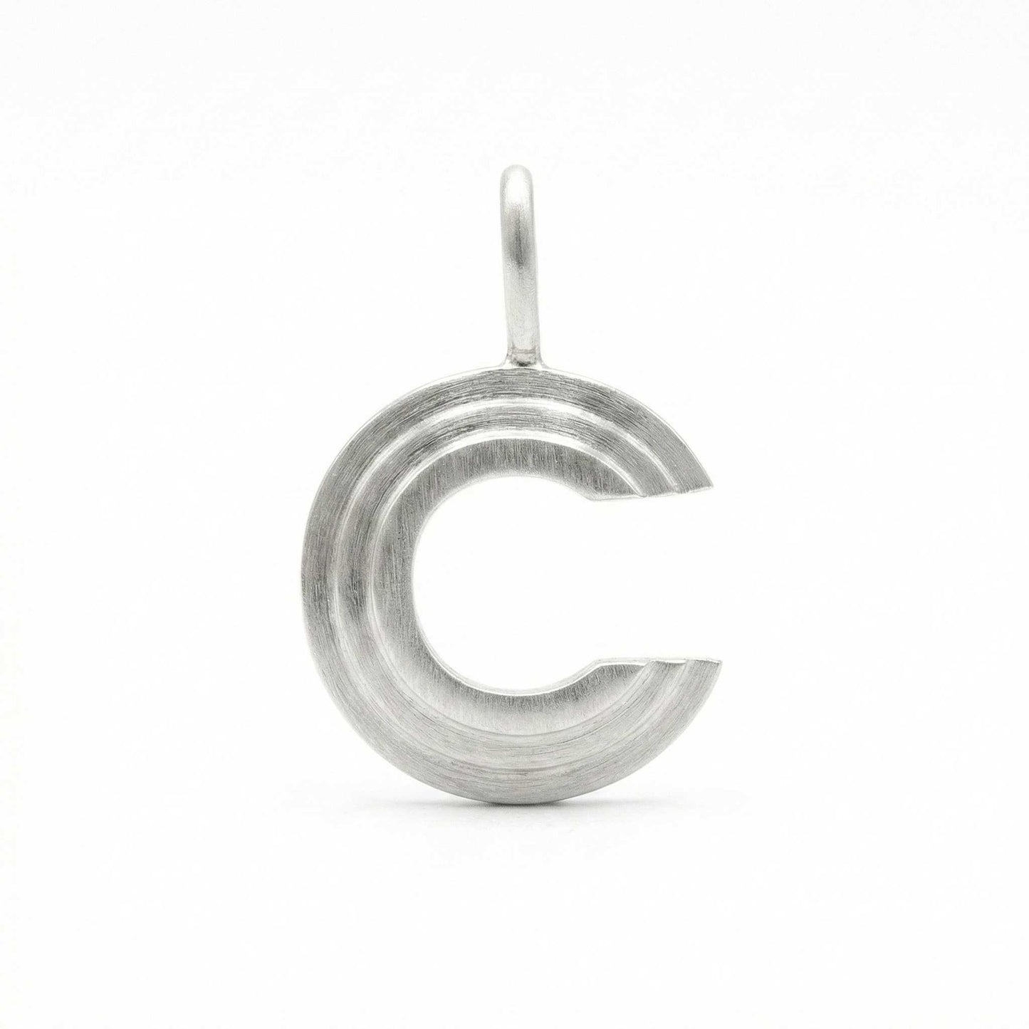 Silver letter 'C' pendant on a white background