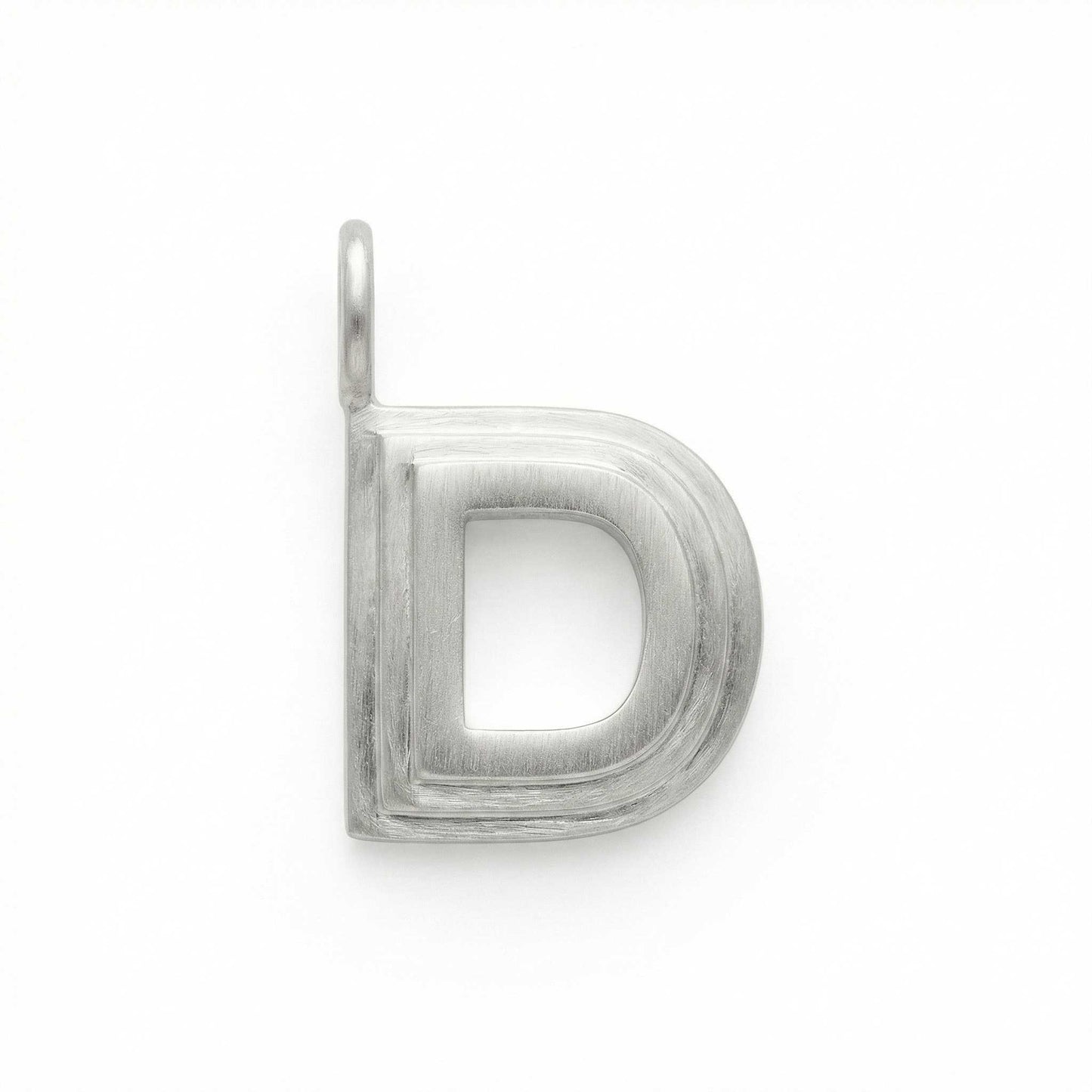 Silver letter 'D' pendant on a white background