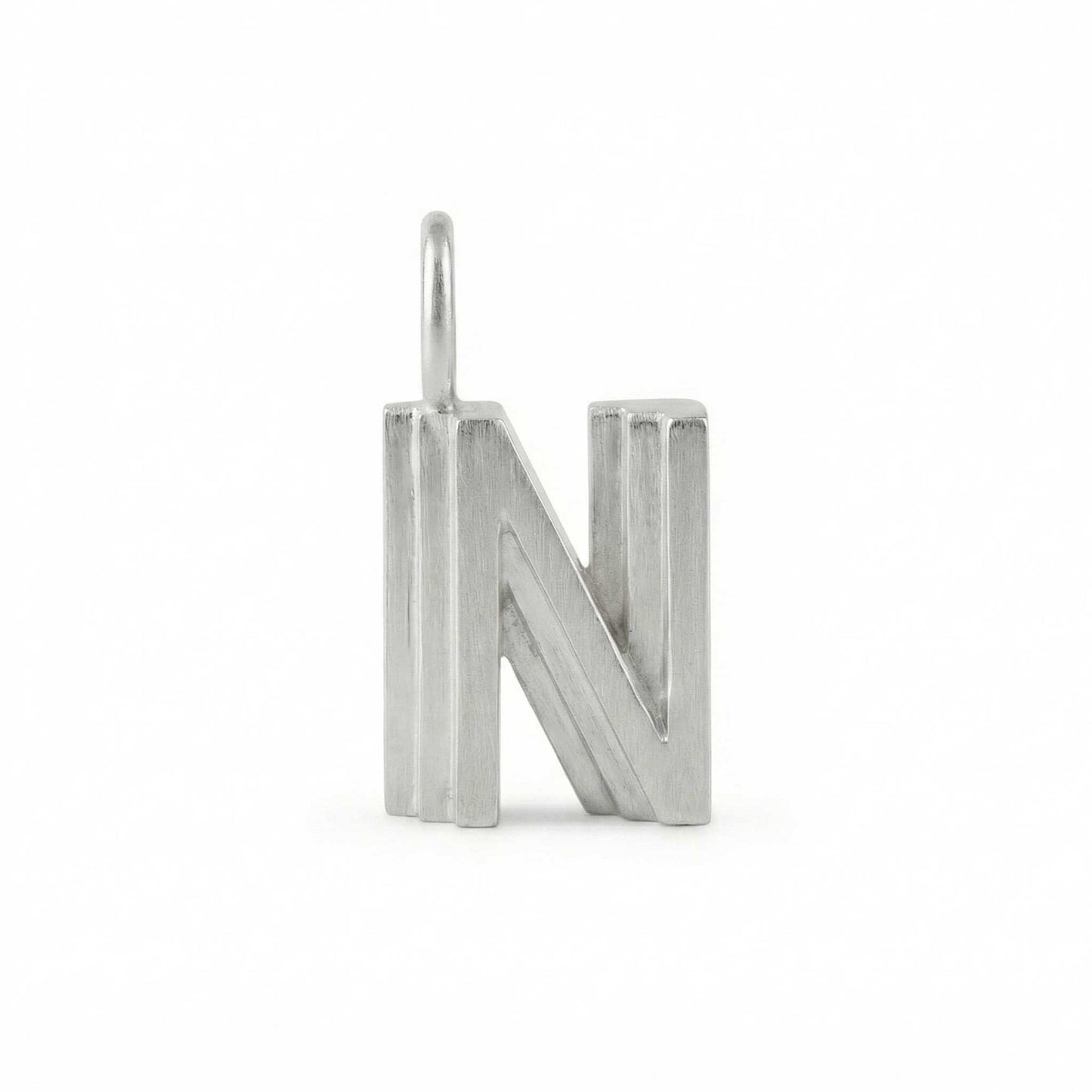 Silver letter 'N' pendant on a white background