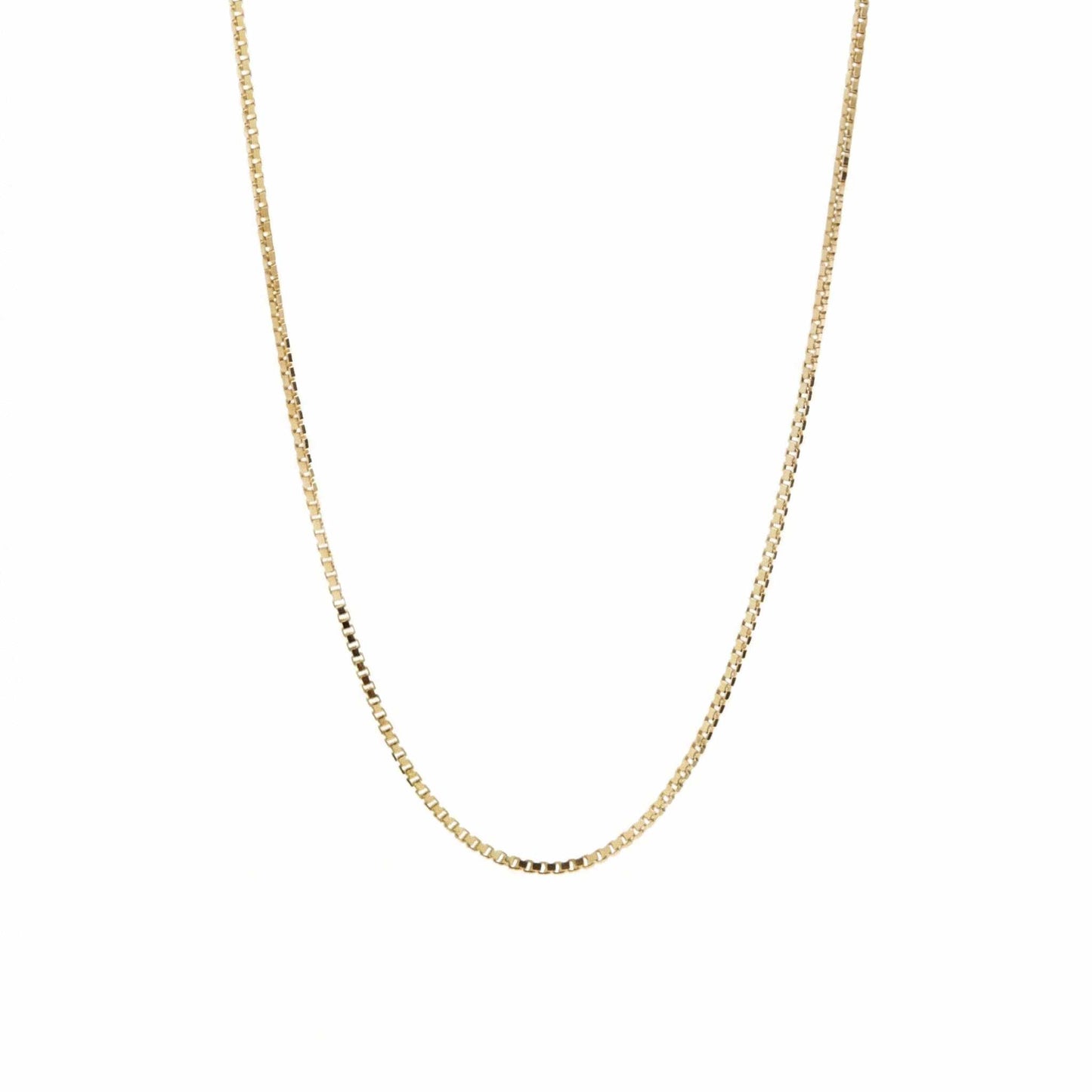 Gold Venezia chain necklace on a white background