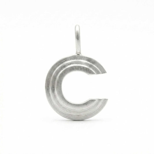 Silver letter 'C' pendant on a white background