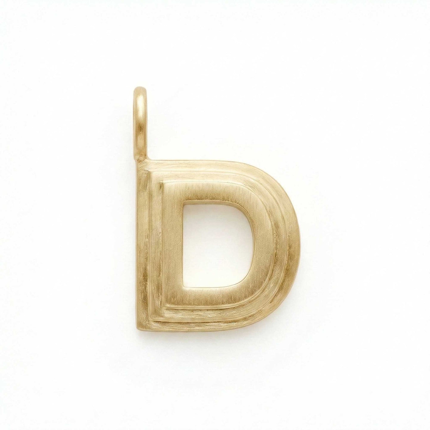 Gold letter 'D' pendant on a white background