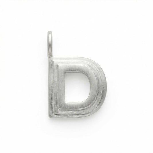 Silver letter 'D' pendant on a white background
