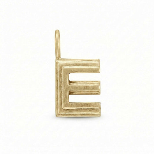 Gold letter 'E' pendant on a white background