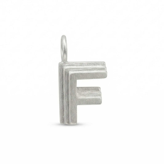 Silver letter 'F' pendant on a white background