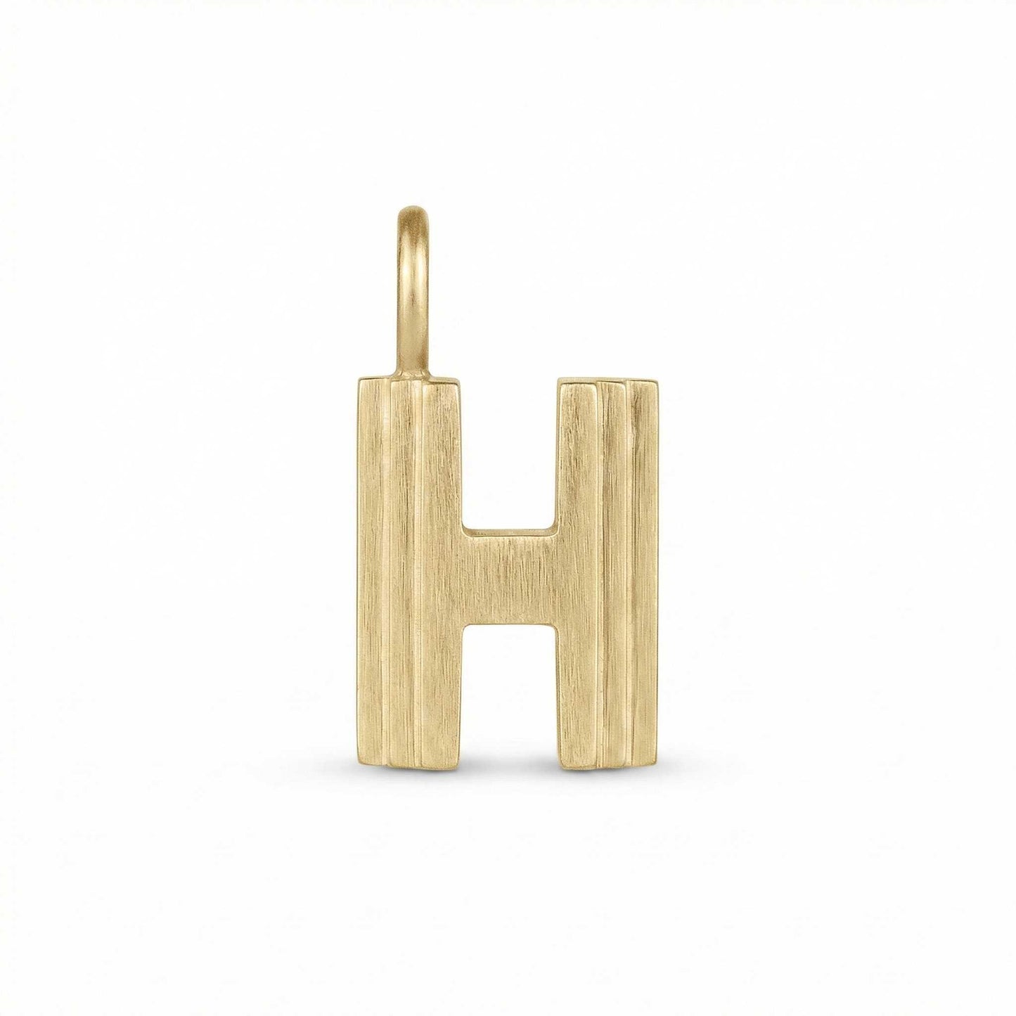 Gold letter 'H' pendant on a white background