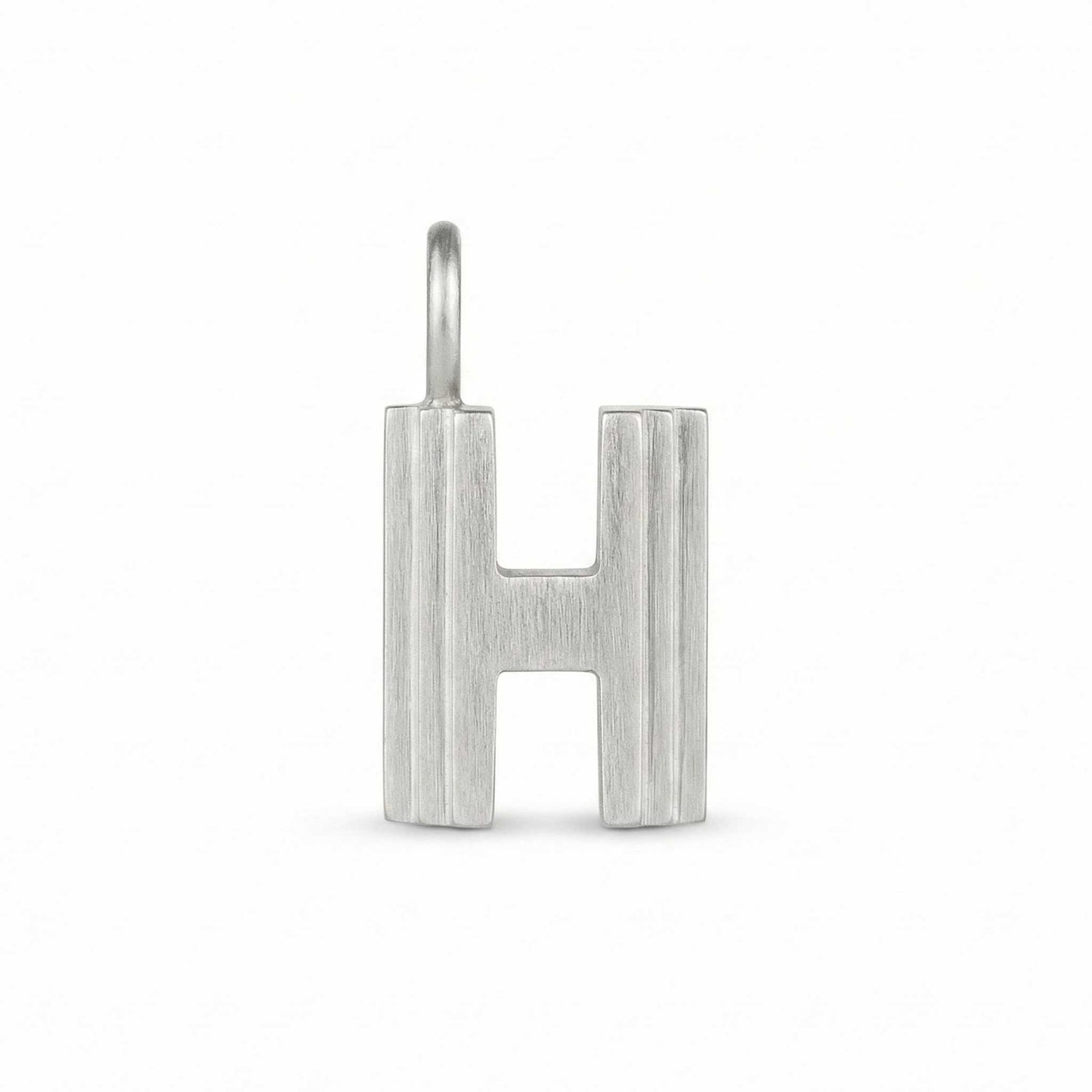 Silver letter 'H' pendant on a white background