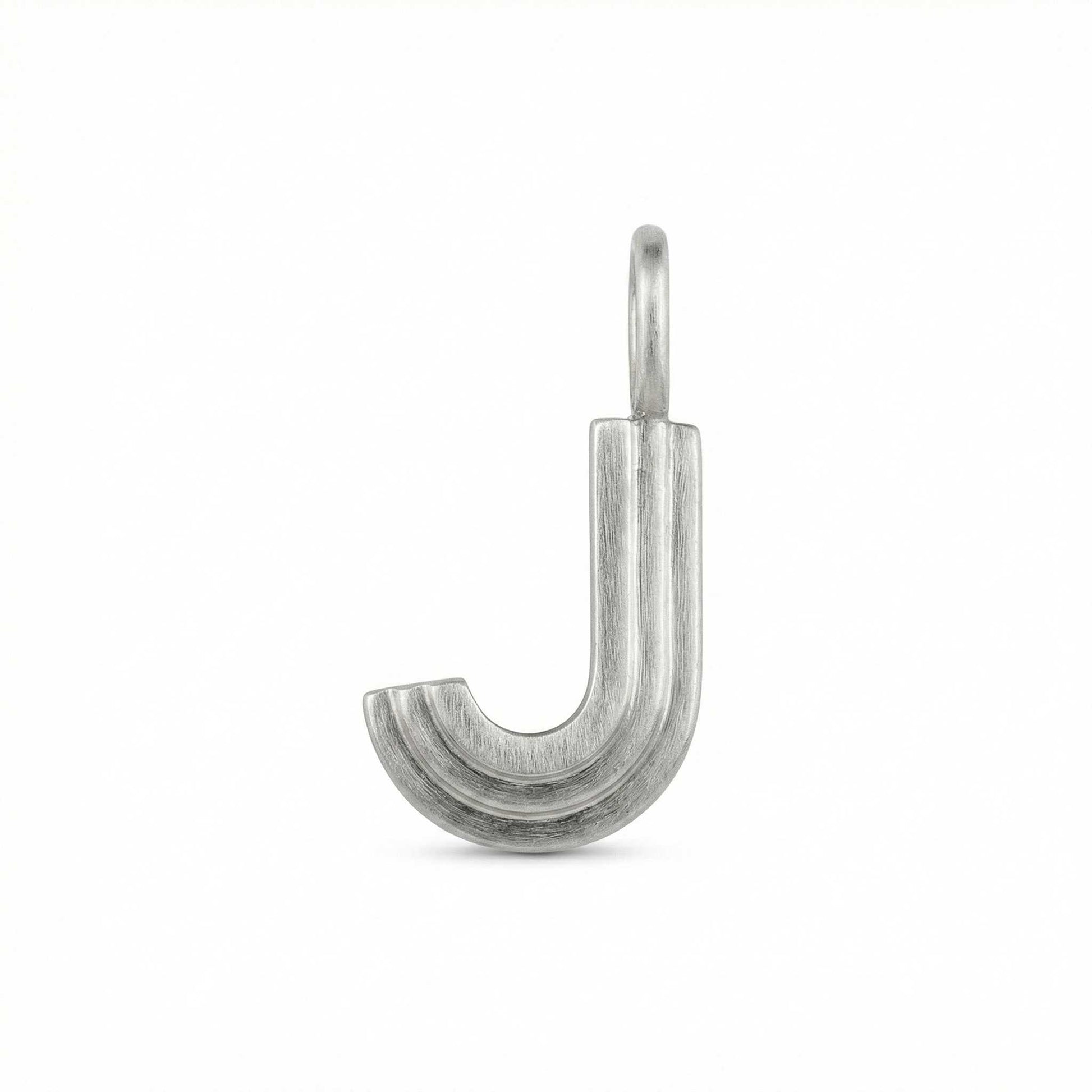 Silver letter 'J' pendant on a white background
