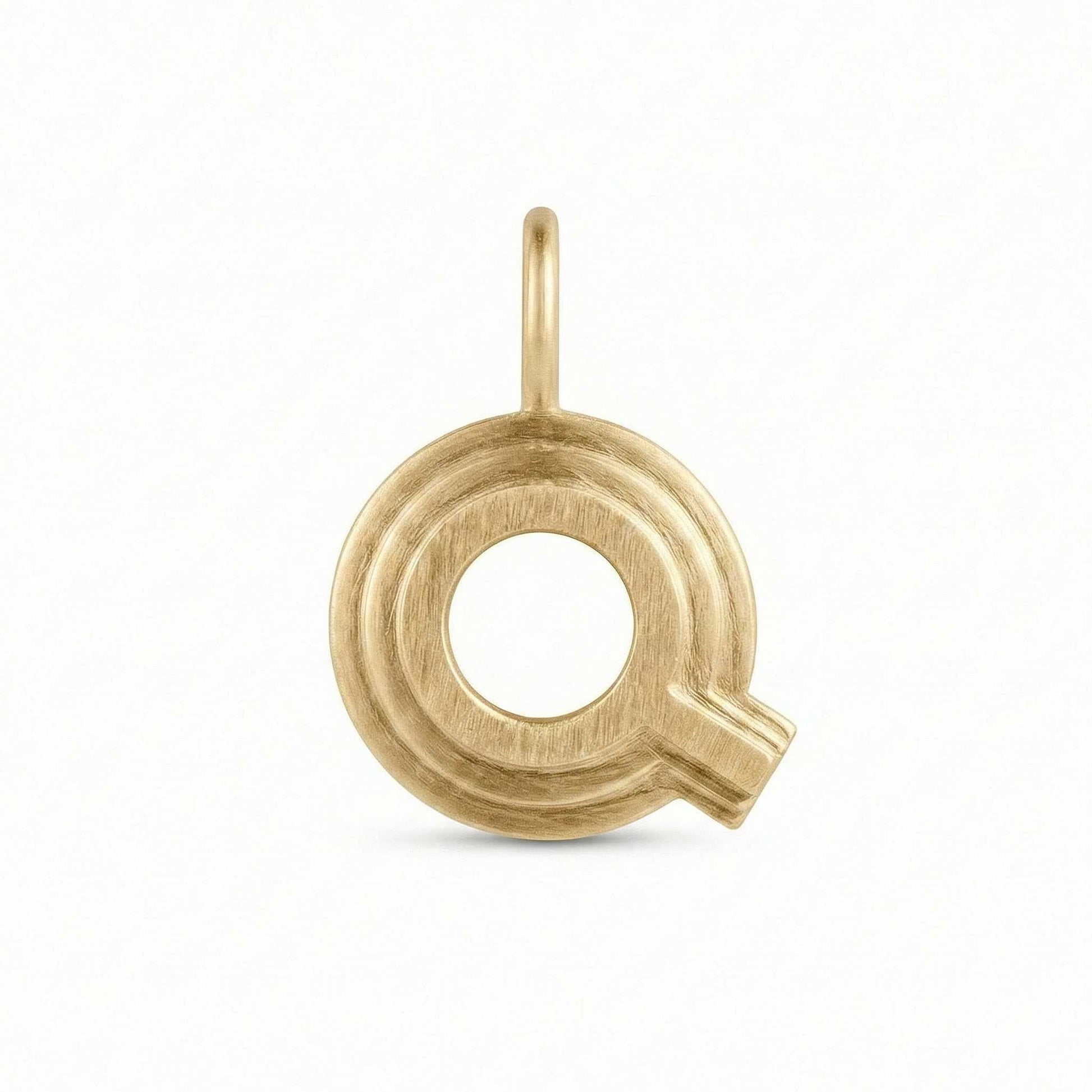 Gold letter 'Q' pendant on a white background
