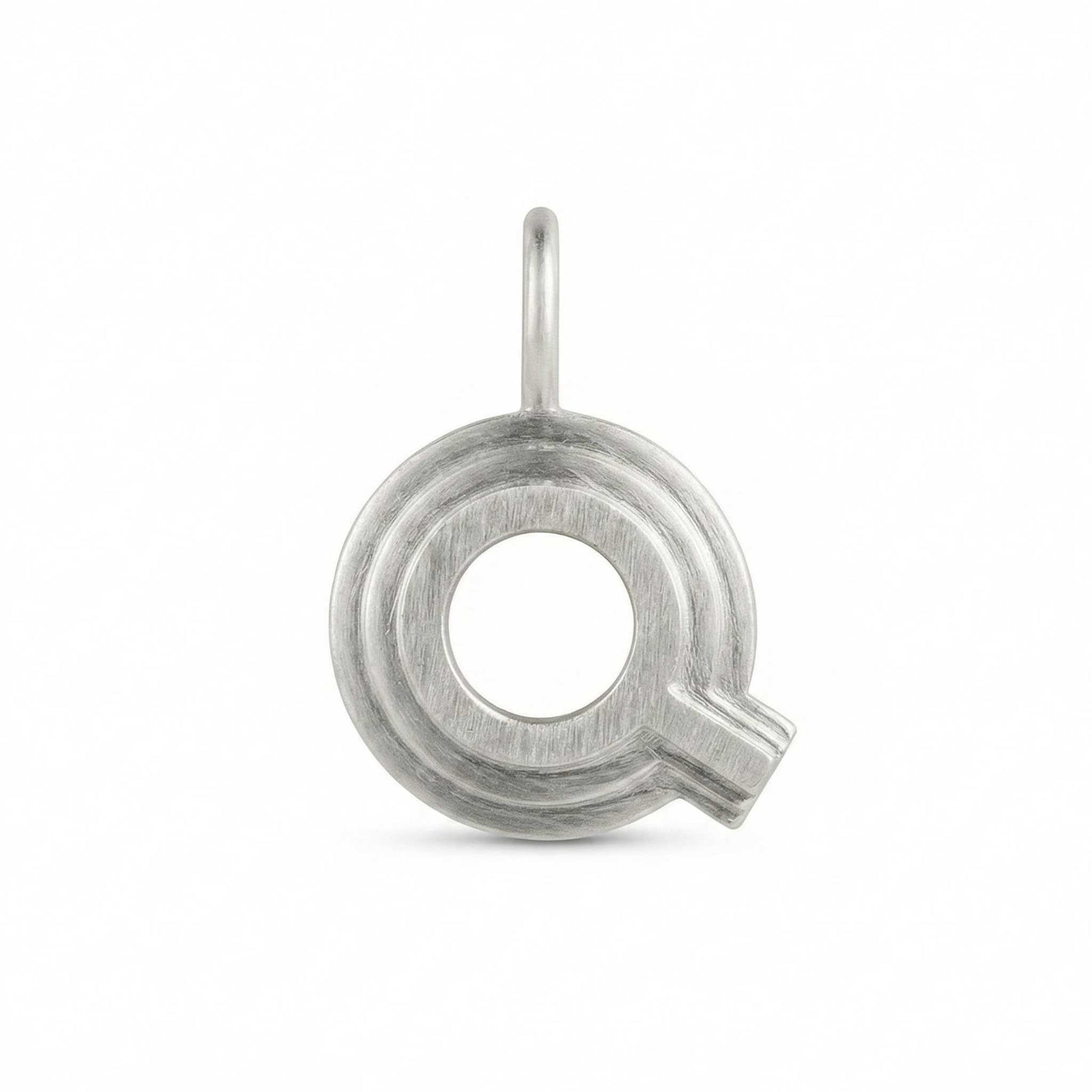 Silver letter 'Q' pendant on a white background