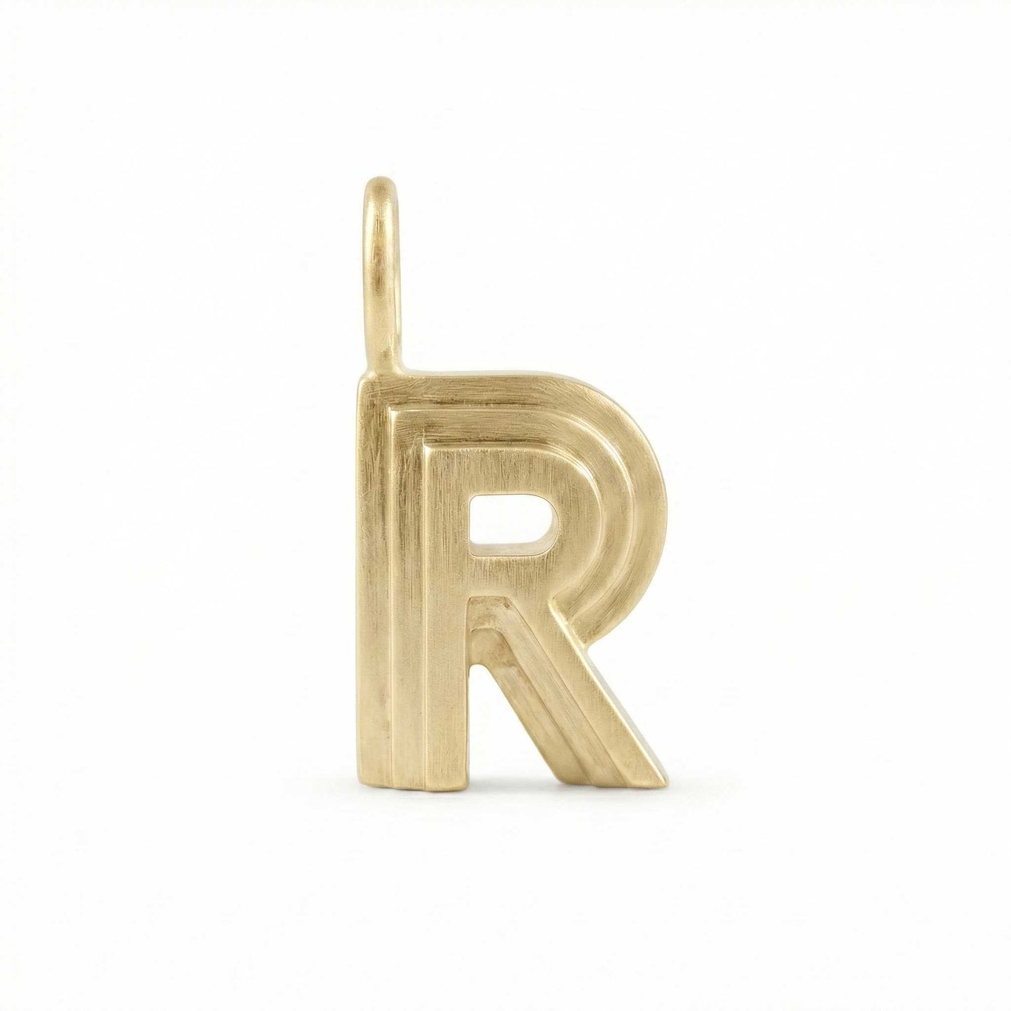 Gold letter 'R' pendant on a white background