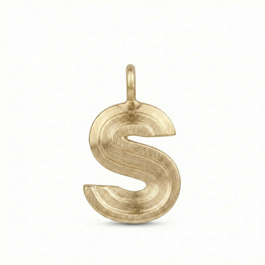 Gold letter 'S' pendant on a white background
