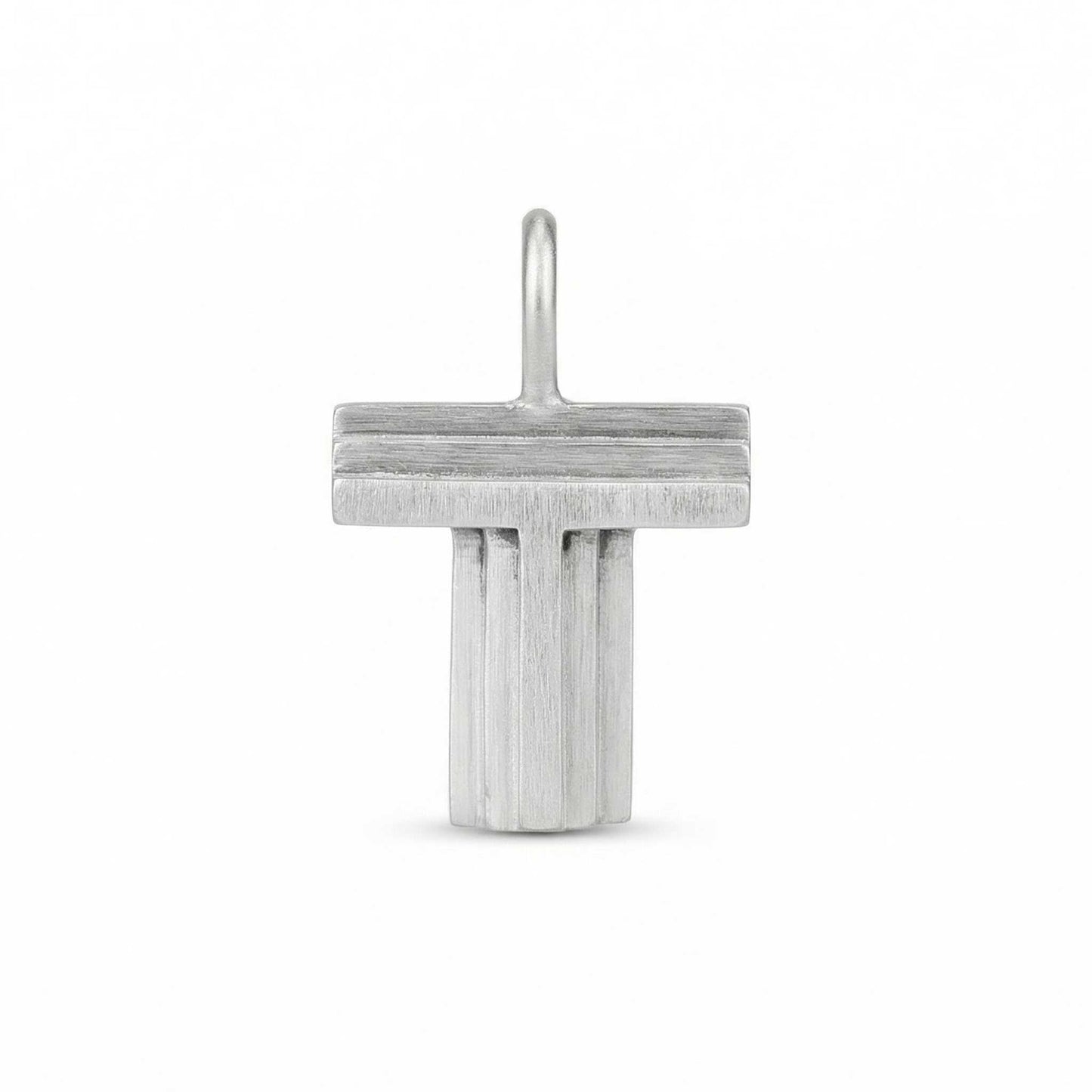 Silver letter 'T' pendant on a white background