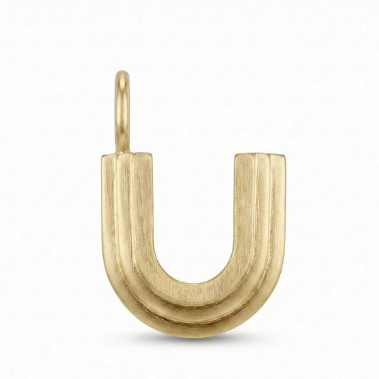 Gold letter 'U' pendant on a white background