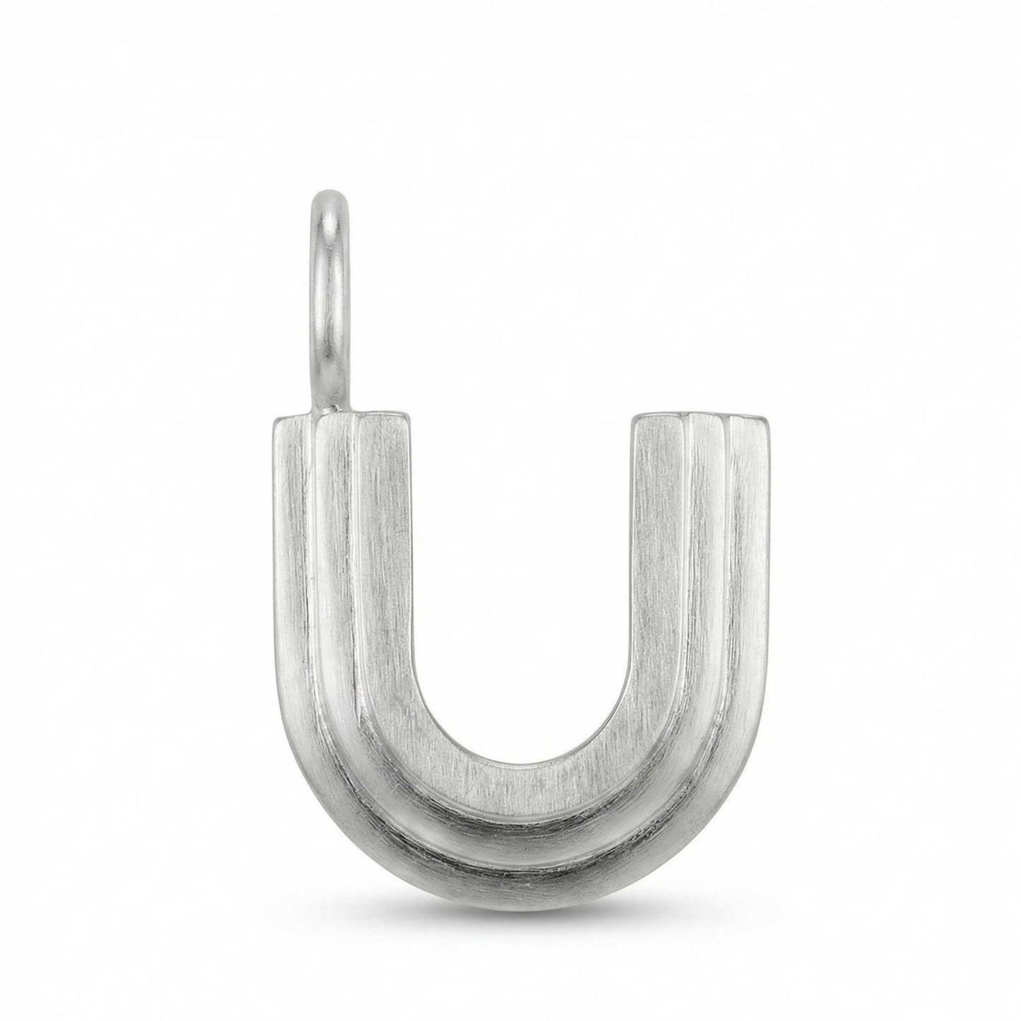 Silver letter 'U' pendant on a white background