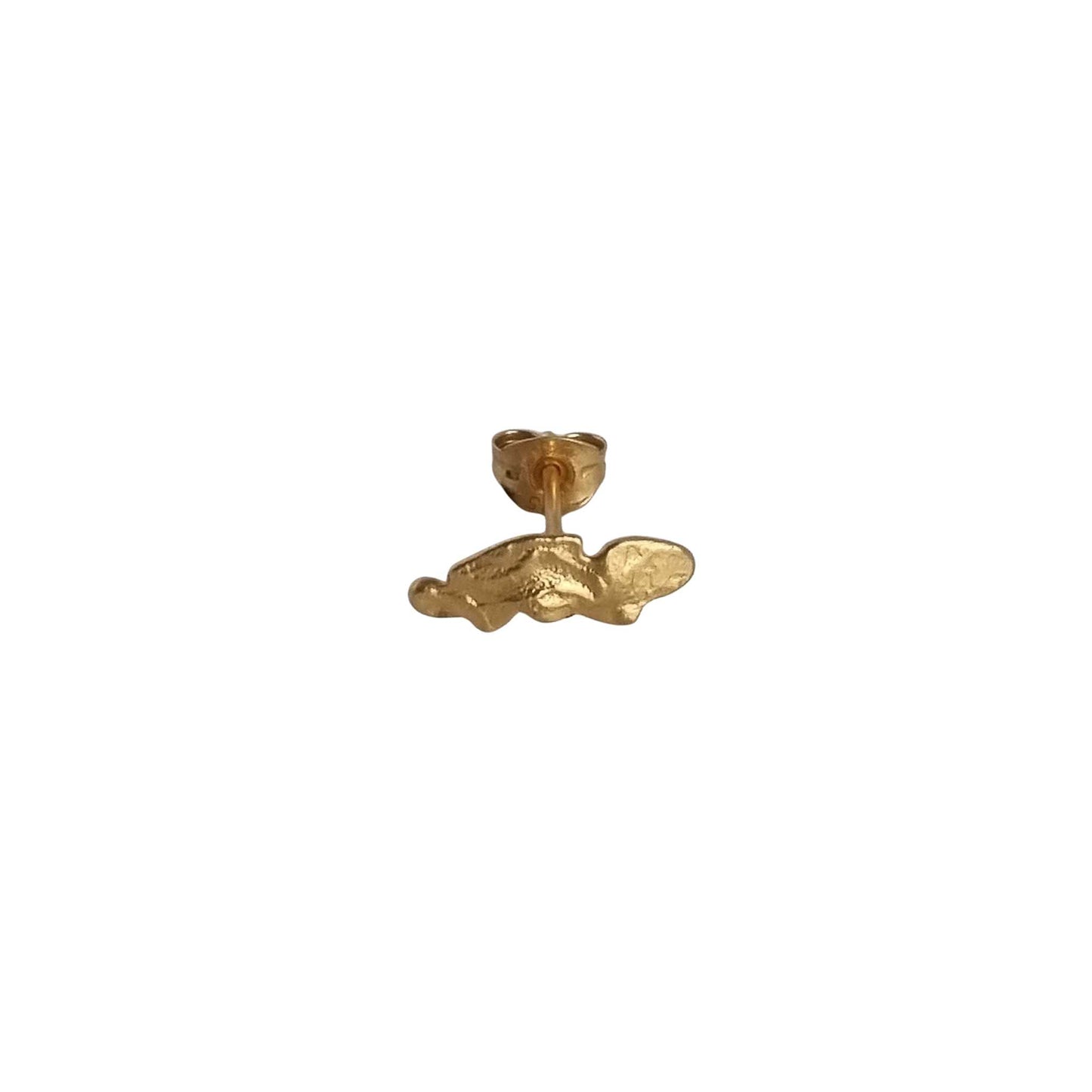 Gold earring on a white background
