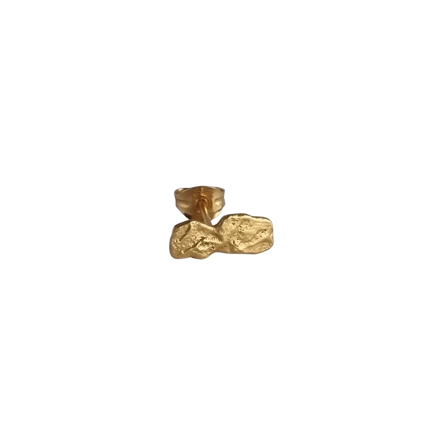 Gold earring on a white background