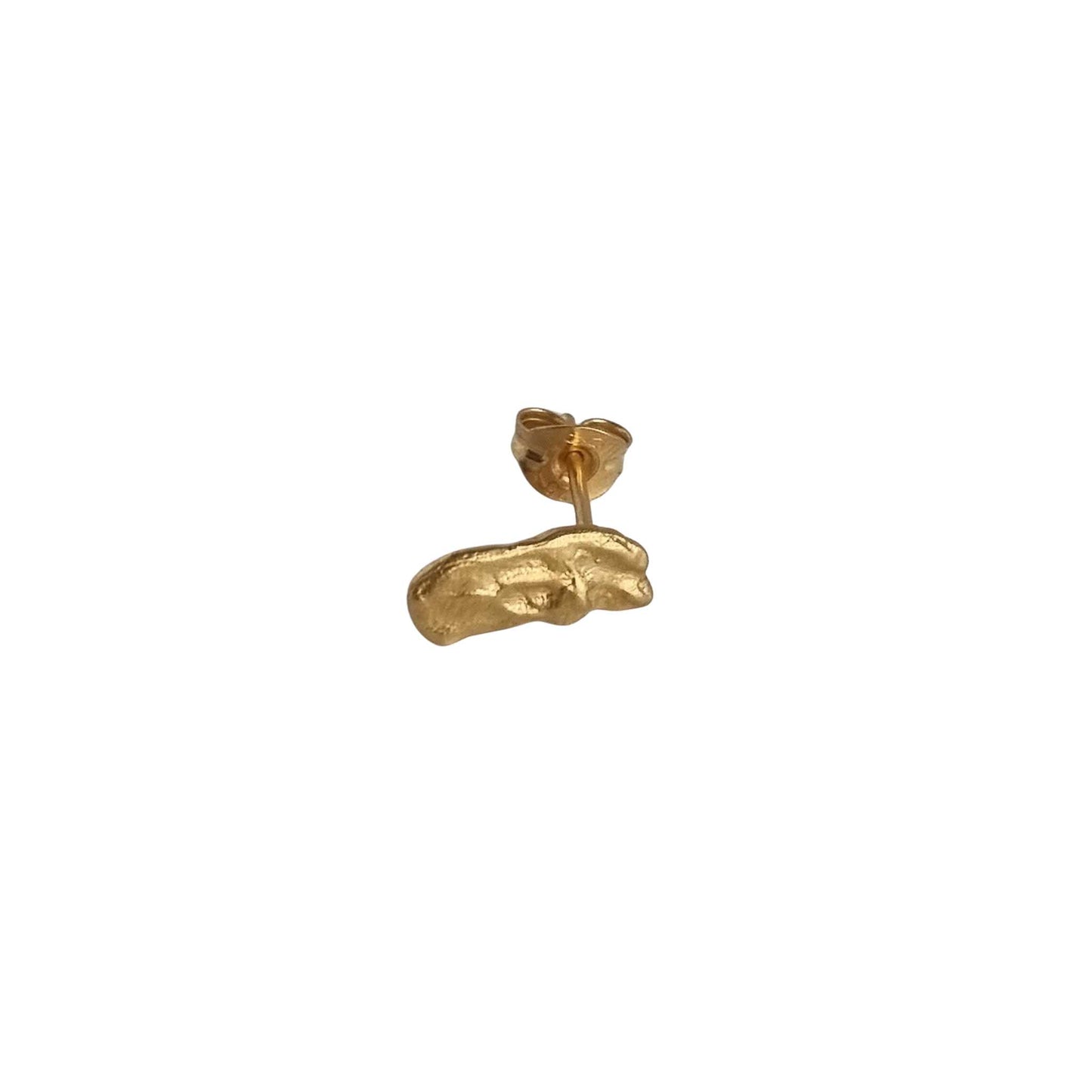 Gold earring on a white background